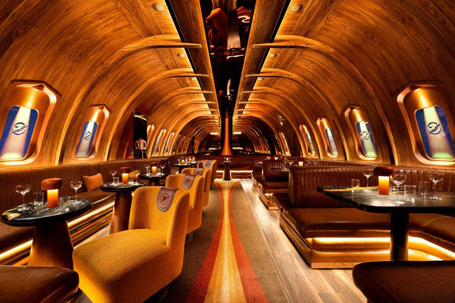 the radical hotel asheville north carolina river arts district afterglow restaurant gold chains around racetrack bar