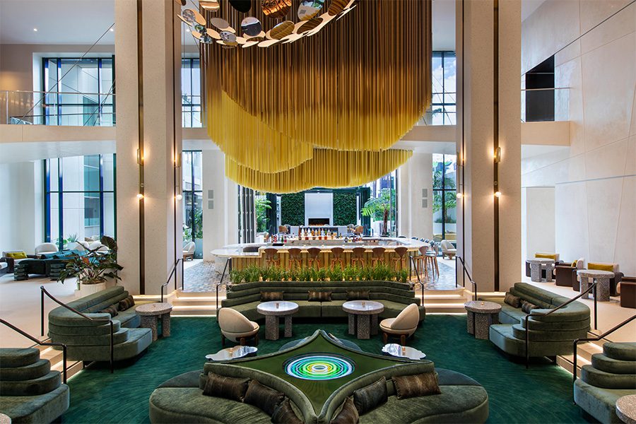 the radical hotel asheville north carolina river arts district afterglow restaurant gold chains around racetrack bar