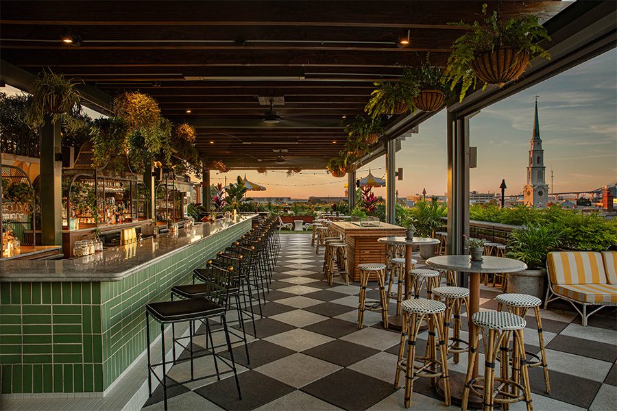 the radical hotel asheville north carolina river arts district afterglow restaurant gold chains around racetrack bar